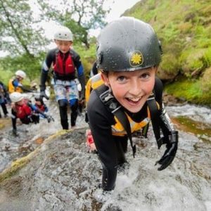 School child learns outside classroom on gorge walking adventure