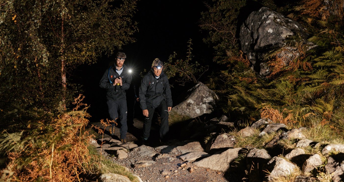 Night-time hiking during the National Three Peaks challenge with headtorches in the mountains